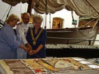 Chief Director of Cultural Affairs for the Western Cape, Ms. Hannetjie Du Preez, Admiral Philip Schoultz, and Mossel Bay Mayor, Alderlady Marie Ferreira, cut the cake at last year’s celebration of the Dias Museum Complex’s birthday. Chief Director of Cultural Affairs for the Western Cape, Ms. Hannetjie Du Preez, Admiral Philip Schoultz, and Mossel Bay Mayor, Alderlady Marie Ferreira, cut the cake at last year’s celebration of the Dias Museum Complex’s birthday.