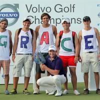 Newly crowned Volvo Champion Branden Grace with the trophy supported by local fans on the podium. Newly crowned Volvo Champion Branden Grace with the trophy supported by local fans on the podium.